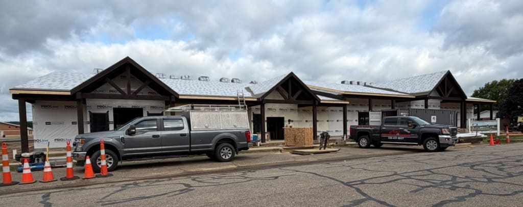 Commercial building with timber gable entries
