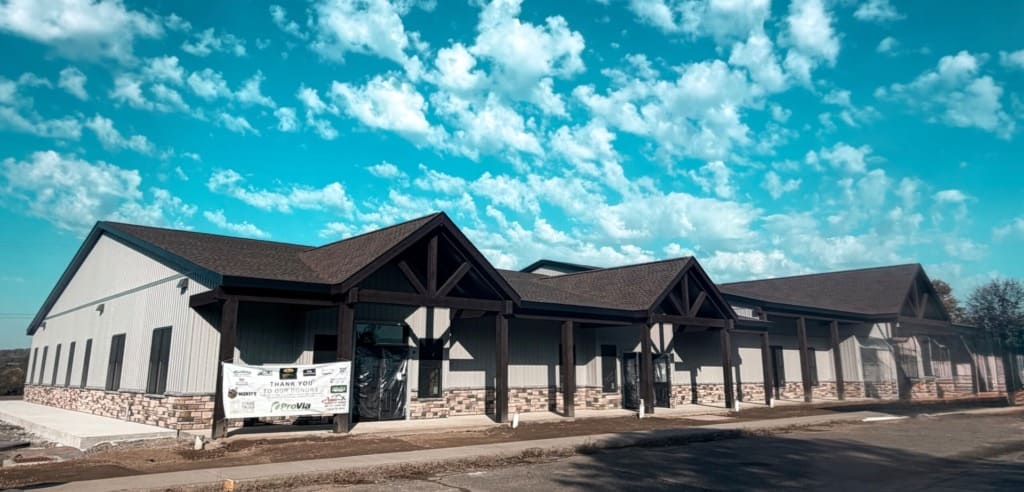 Commercial building with timber gable entries