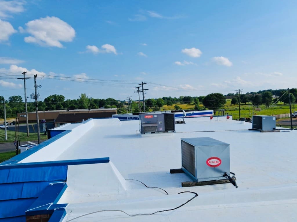 White flat roof with rooftop units